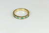 Channel-set Emerald and Diamond Ring