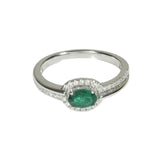 Centered Emerald and Diamond Ring