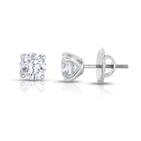 Platinum white diamond stud earrings, stunning 4.02 total carat weight.