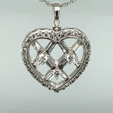 Spectacular Round and Baguette Diamond Heart Pendant